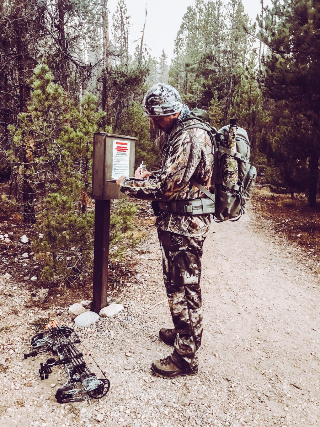 Mike signing in on the required document for public land hunting in Colorado