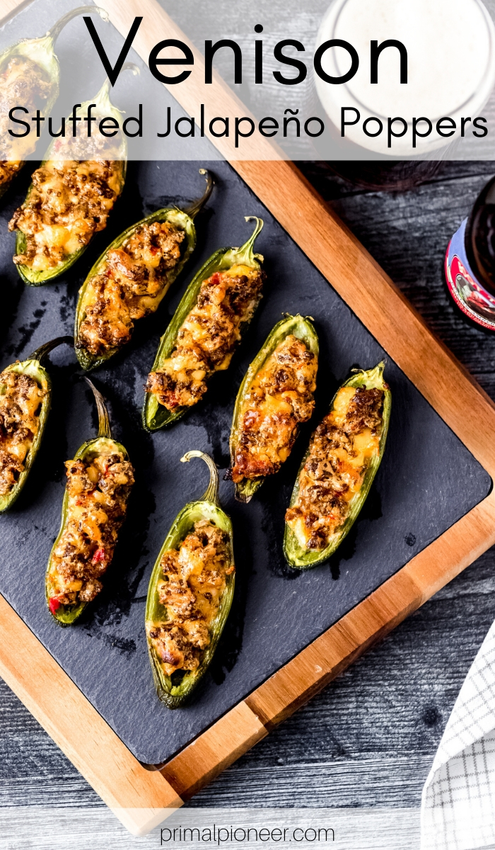 venison stuffed jalapeño peppers on a slate cutting board