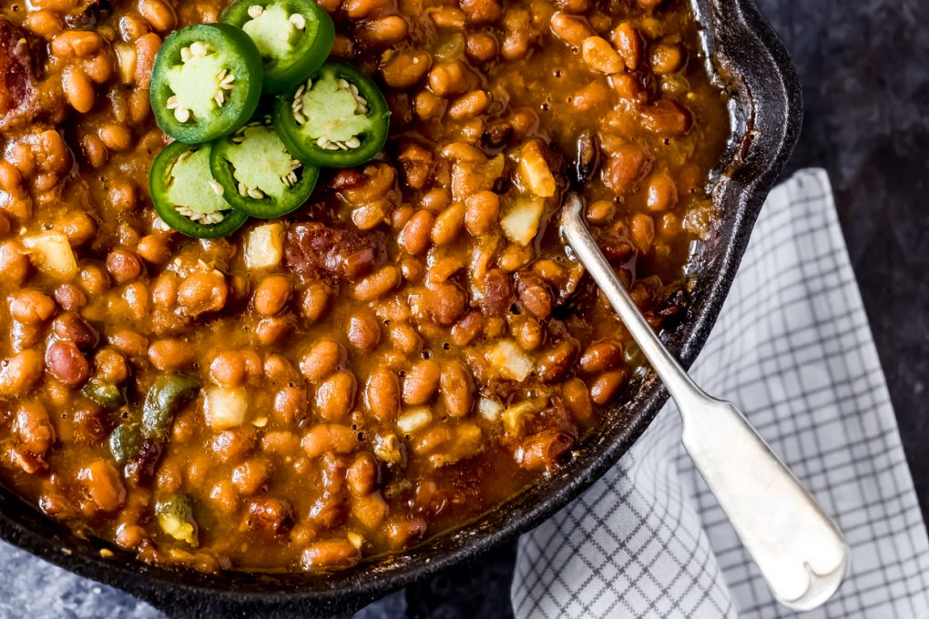 a skillet of smoked baked beans