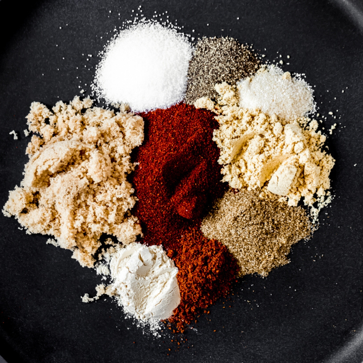 spices on a plate for a homemade seasoning blend