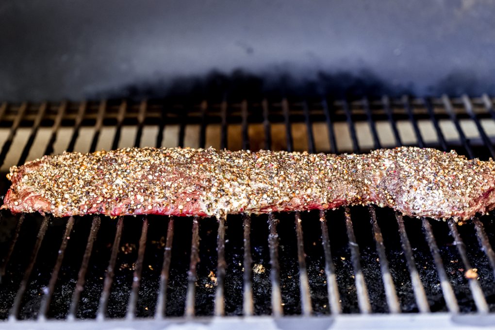 a peppercorn crusted elk tenderloin on a Traeger grill
