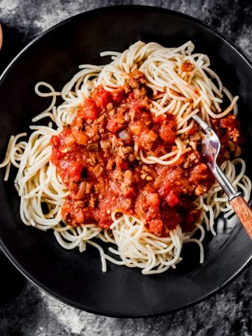 a bowl of spaghetti with ground venison sauce